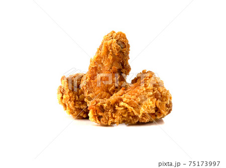 Fried wings on a white background. Deep-fried chicken wings close-up. Fried wings on a white background. Deep-fried chicken wings close-up. 75173997