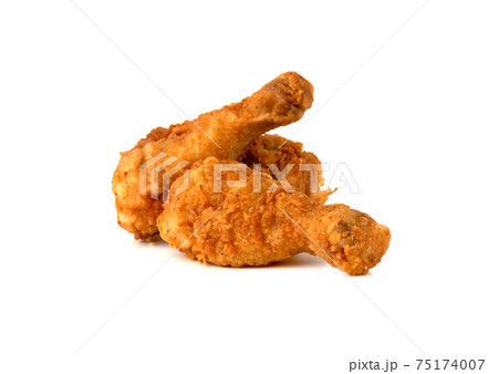 Fried legs on a white background. Chicken legs deep fried close-up. Fried legs on a white background. Chicken legs deep fried close-up. 75174007