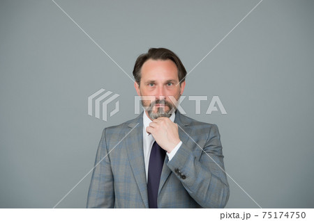 mature businessman with beard and moustache wear stylish formal suit, agile business 75174750