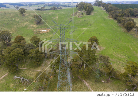 Aerial view of a steel Transmission Tower in farmland Aerial view of a steel Transmission Tower in farmland 75175312