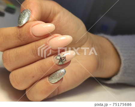 fashion manicure of nails on a beautiful background 75175686