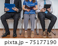 Group of people waiting for interview in a waiting room. 75177190