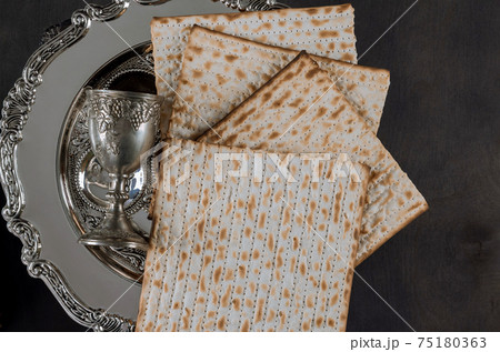 Jewish Passover attributes in composition a wine and passover matzah Jewish Passover attributes in composition a wine and passover matzah 75180363