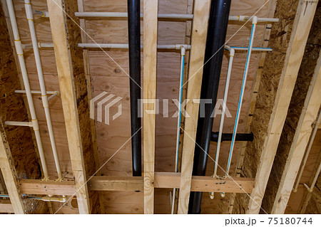 Under construction new home PVC waste water system rough plumbing 75180744