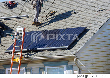 Alternative energy for installed solar panels in use on roof home 75180752