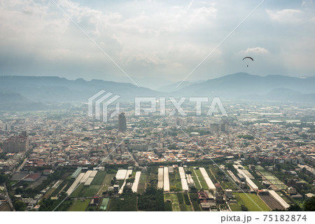 colorful paragliding over blue sky at town 75182874