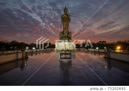 Buddhism Ceremony, Candlelight light trails of people walking around the church in Magha Puja Day, Important day in buddha religion at Phutthamonthon park, Nakhon Pathom. Buddhism Ceremony, Candlelight light trails of people walking around the church in Magha Puja Day, Important day in buddha religion at Phutthamonthon park, Nakhon Pathom. 75202692