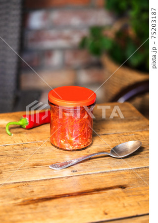 Borscht in a jar. Fresh borscht soup in a glass jar. Fast food 75203187