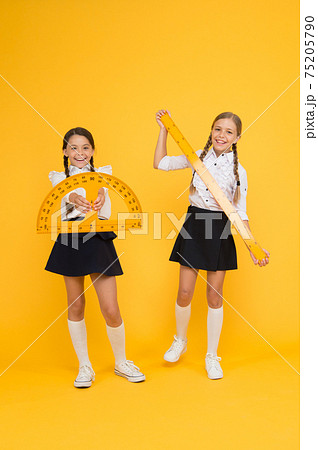 School students study geometry. Pupil school girls big School students study geometry. Pupil school girls big 75205790