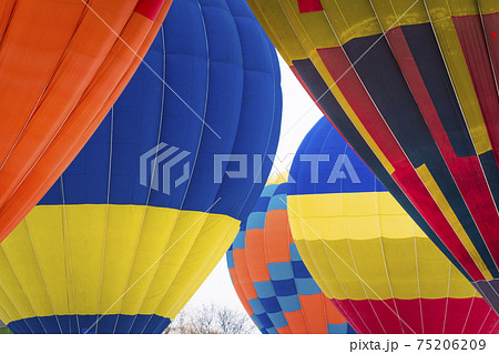 Closeup of colorful Hot Air Ballon flying in the sky. 75206209