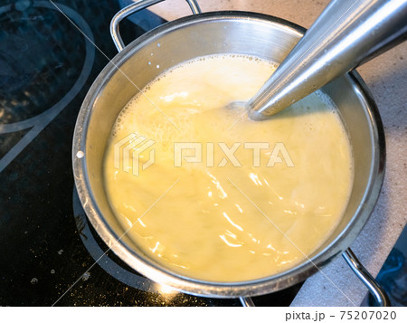 cooking vegetable soup puree on stove at home 75207020