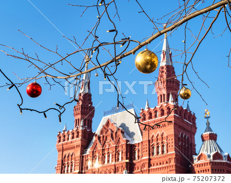 Christmas baubles on branch in Moscow city 75207372