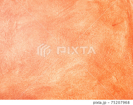 orange painted wall glistening in the sunlight 75207968