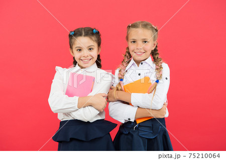 We have all the best stories. Little girls holding books We have all the best stories. Little girls holding books 75210064