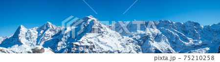 View from Muerren ski region to the famous alpine peaks like Eiger and Jungfrau View from Muerren ski region to the famous alpine peaks like Eiger and Jungfrau 75210258