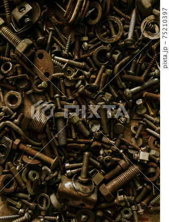 Various old metal iron nuts bolts nails wrenches Various old metal iron nuts bolts nails wrenches 75210397