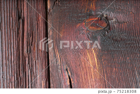 Two planks of old brown wood texture with holes 75218308