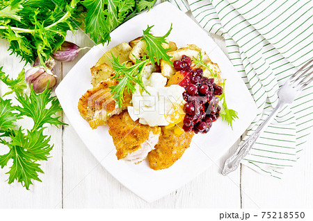 Turkey breast with cranberry sauce on board top Turkey breast with cranberry sauce on board top 75218550