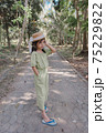 little girl in dress standing and posing 75229822