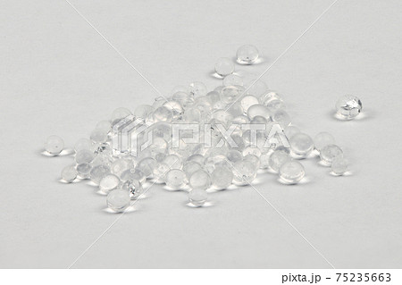 Polymer pellets. Pile of silica gel. 75235663