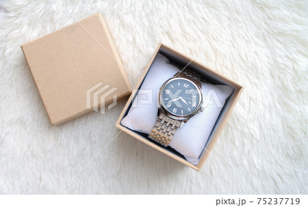 Luxury male wristwatches in gift box or case top view 75237719