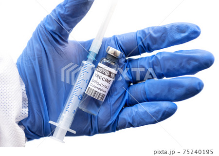 Coronavirus vaccine in doctor hand isolated on white, bottle and syringe in gloved palm 75240195