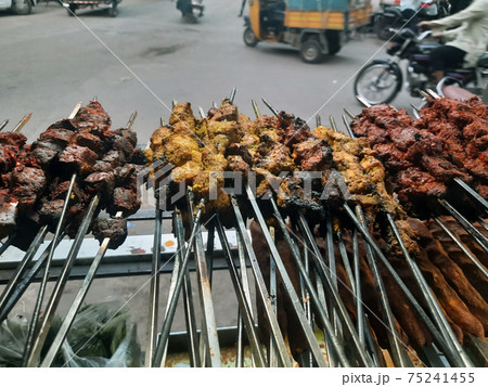 Royalty-free stock photo ID: 96853159Kebabs - Selection of chicken tikka, paneer tikka and seekh kebabs served with crunchy salad, mint raita and lemon wedges. Royalty-free stock photo ID: 96853159Kebabs - Selection of chicken tikka, paneer tikka and seekh kebabs served with crunchy salad, mint raita and lemon wedges. 75241455