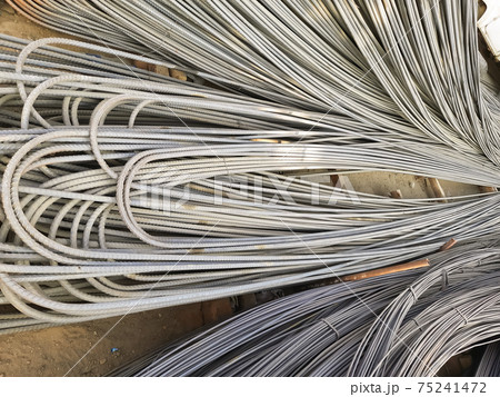 Steel rods or bars used to reinforce concrete, in warehouse 75241472
