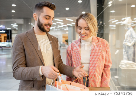 Couple happy with purchases 75241756