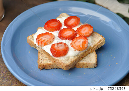 bread, toast with whipped cream and strawberry bread, toast with whipped cream and strawberry 75248543