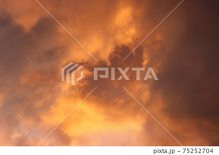 Sky with clouds at sunrise. 75252704