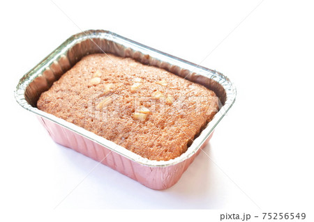 butter banana cake topping peanut in aluminum tray on white background 75256549