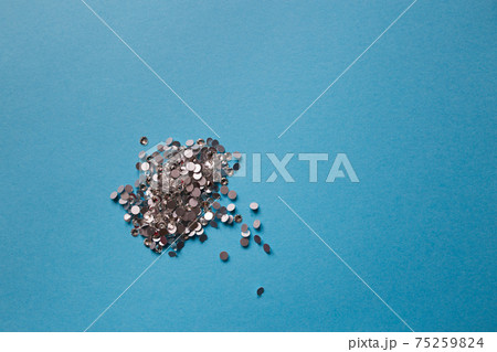 rhinestones on a blue background, top photo. design for text rhinestones on a blue background, top photo. design for text 75259824