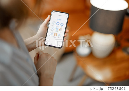 Smartphone with launched application to adjust the light bulb Smartphone with launched application to adjust the light bulb 75263801
