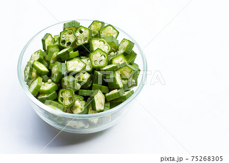 Fresh okra in glass bowl isolated on white 75268305