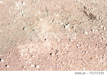 Brown ground surface textured. Dry soil surface Brown ground surface textured. Dry soil surface 75272202