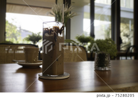 Iced chocolate mocha on wooden table Iced chocolate mocha on wooden table 75280205
