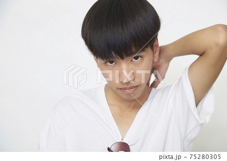 Handsome Asian guy on white Handsome Asian guy on white 75280305