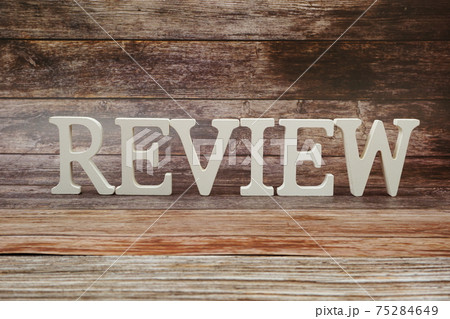 Review Word alphabet letters on wooden background Review Word alphabet letters on wooden background 75284649