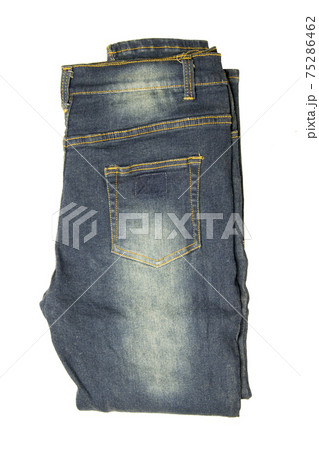blue jeans. jeans folded isolated on white background blue jeans. jeans folded isolated on white background 75286462