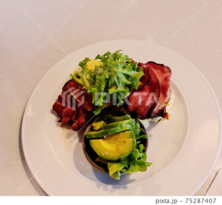 Eggs Benedict Hidden Under Bacon 75287407