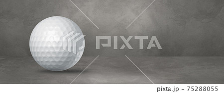 White golf ball on a concrete studio banner White golf ball on a concrete studio banner 75288055