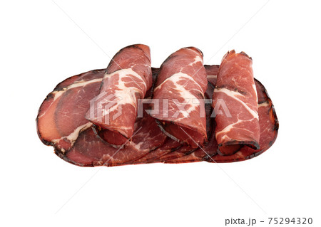 Three rolled-up pieces of smoked pork neck. 75294320
