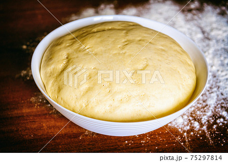 Preparing dough for bread Preparing dough for bread 75297814