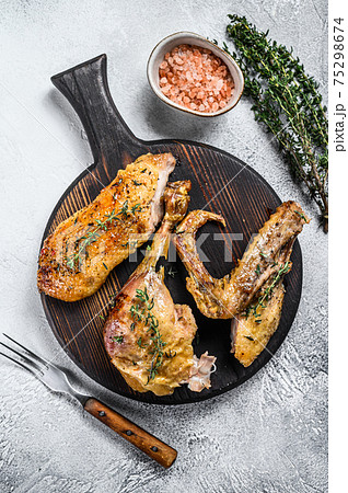 Butchered roast goose, breast fillet, wing, leg. White background. Top view Butchered roast goose, breast fillet, wing, leg. White background. Top view 75298674