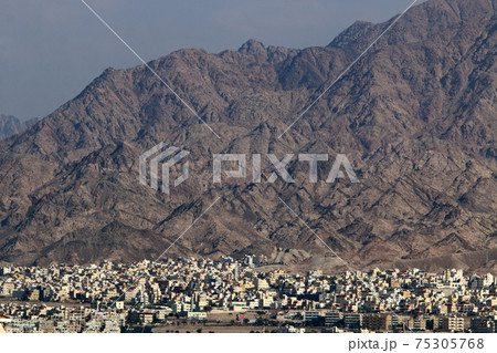 Jordan on the other side of the Gulf of Eilat. Photo taken from the side of Israel Jordan on the other side of the Gulf of Eilat. Photo taken from the side of Israel 75305768