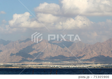 Jordan on the other side of the Gulf of Eilat. Photo taken from the side of Israel Jordan on the other side of the Gulf of Eilat. Photo taken from the side of Israel 75305900