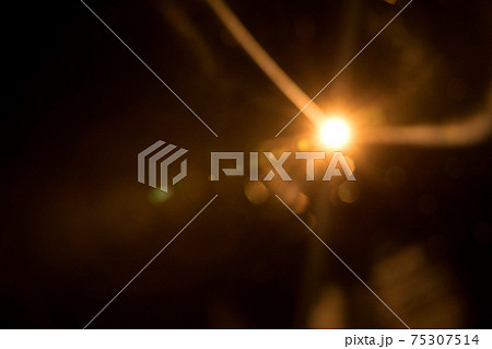 Abstract Natural Sun flare on the black 75307514