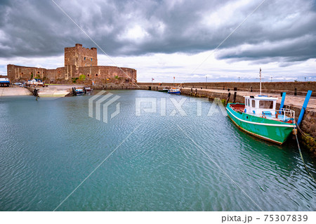 Medieval norman Carrickfergus Castle close to Belfast, Northern Ireland, UK 75307839
