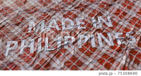 MADE IN PHILIPPINES text printed on a fabric, national textile production conceptual 3d rendering 75308690
